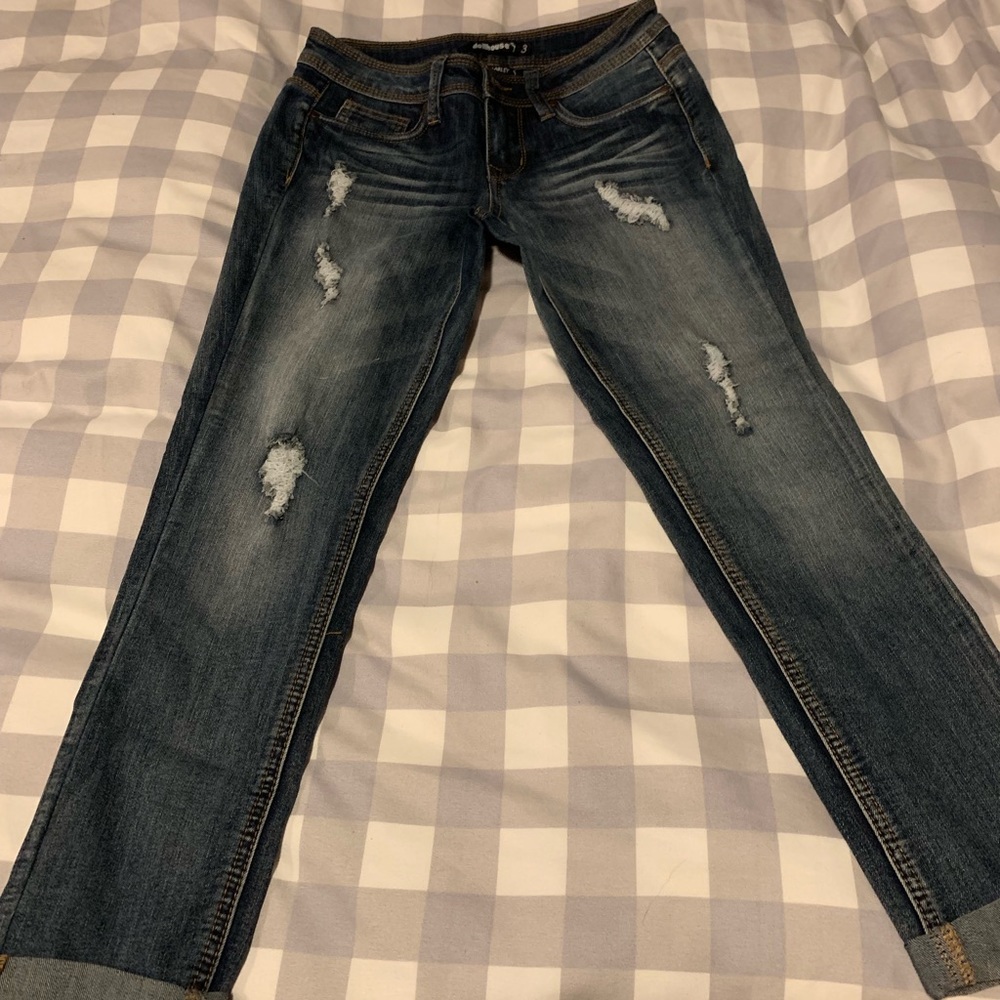 Jeans ripped.
